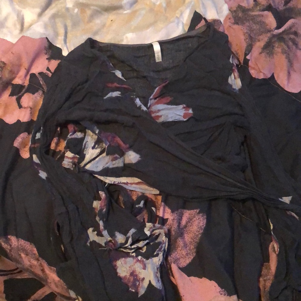 Crisscross blouse with flowers on it